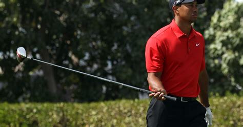 Tiger Woods apologizes for spitting .